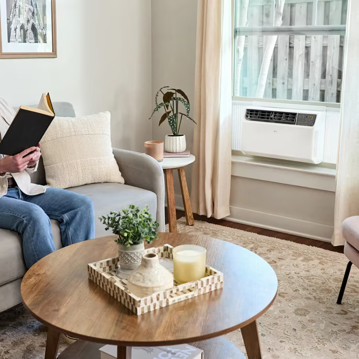 LG LW8024IVSM air conditioner installed in a window in a home setting