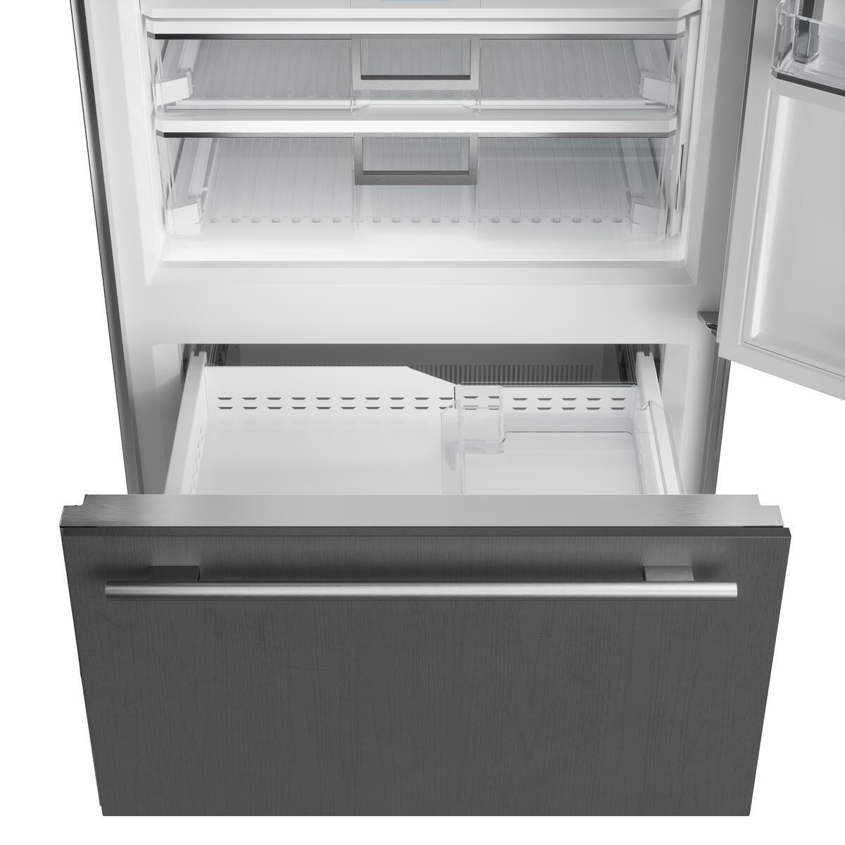 Interior view of Sub-Zero CL3650UIDSTL showing bottom of refrigerator shelving and bottom freezer compartment