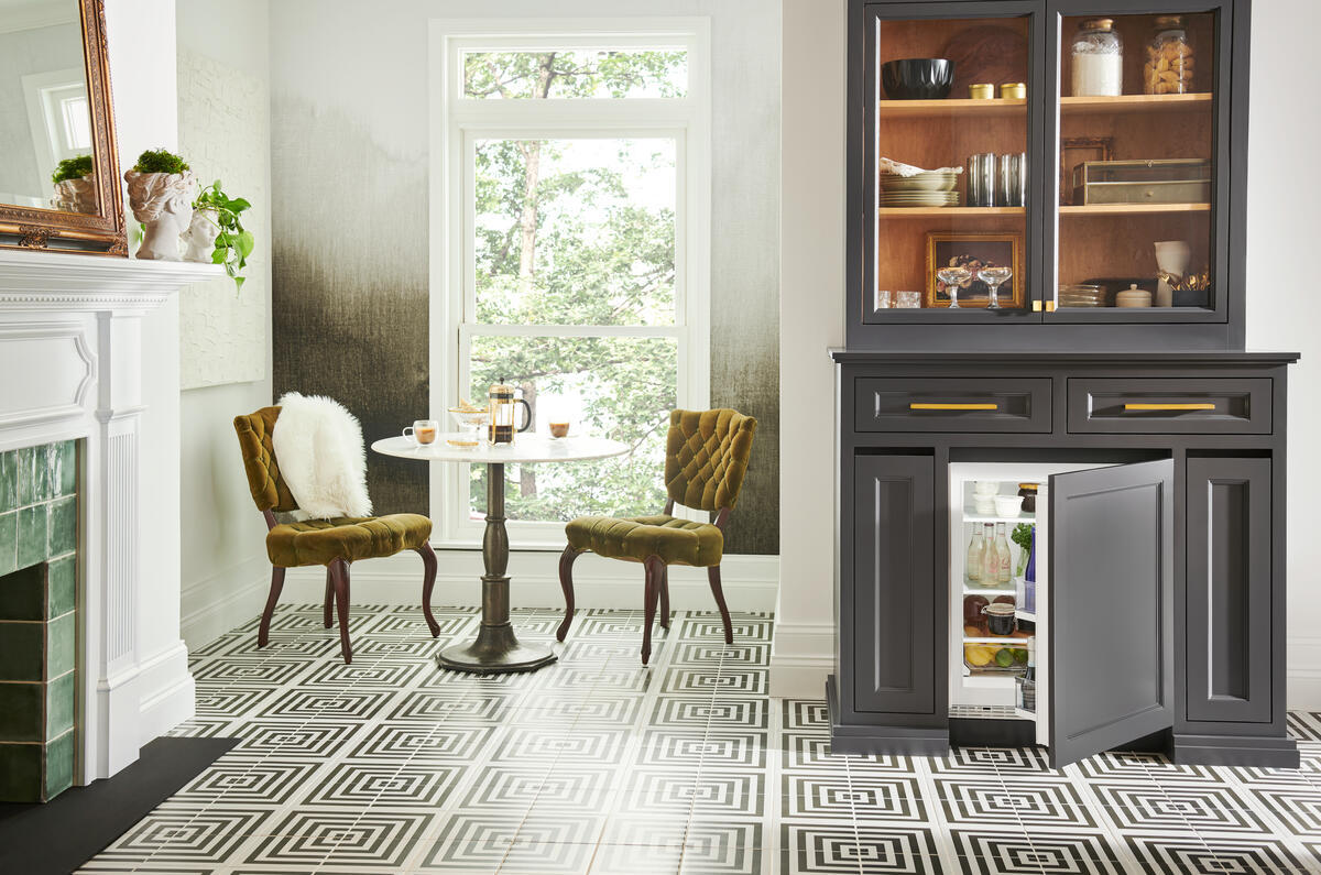 Sub-Zero DEU2450RADAL Designer Series Built-In Undercounter Refrigerator shown in a luxury built-in kitchen setting