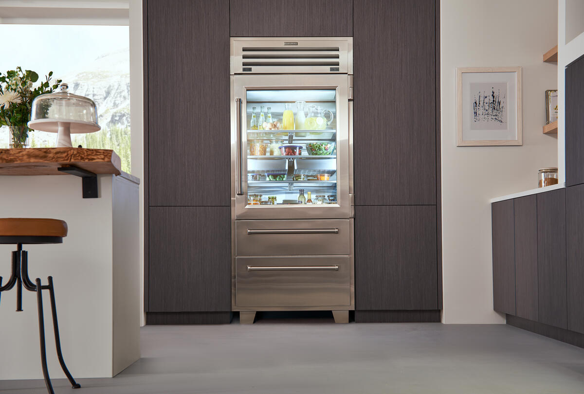 Sub-Zero PRO3650GLH Pro Series Built-In Bottom Freezer Refrigerator shown in a luxury built-in kitchen setting