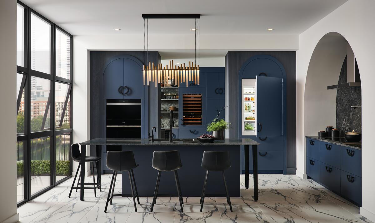 Sub-Zero DET3650CIIDR Designer Series Built-In Bottom Freezer Refrigerator shown in a luxury built-in kitchen setting