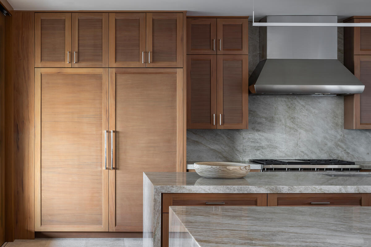 Sub-Zero DEC3650RID-L Designer Series Built-In Freezerless Refrigerator shown in a luxury built-in kitchen setting