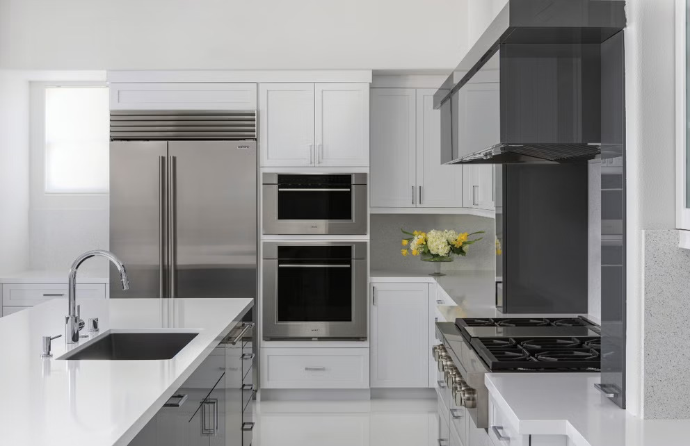 Sub-Zero CL4250SIDST Classic Built-In Side-by-Side Refrigerator shown in a luxury built-in kitchen setting