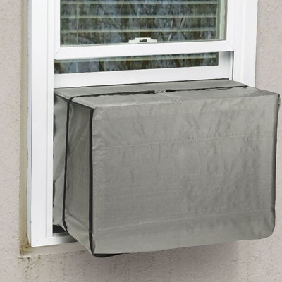A window air conditioner wrapped in a cover.